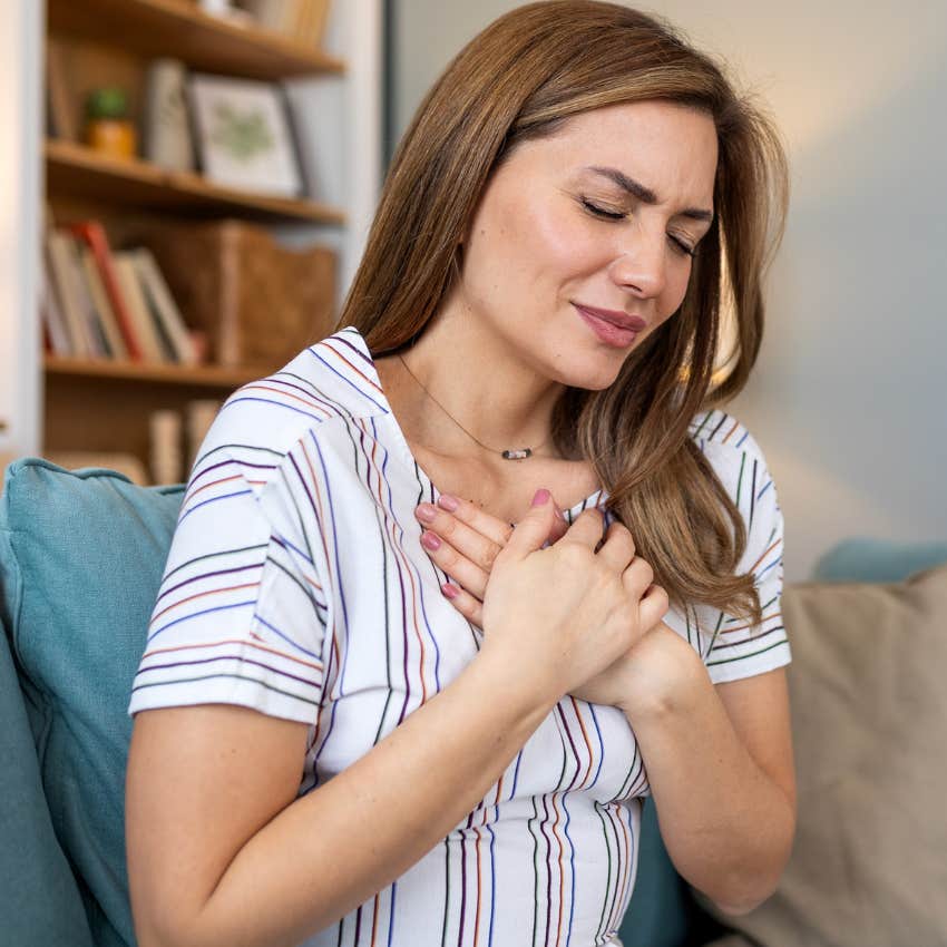 Woman who mistakes anxiety for intuition holding tension in her body