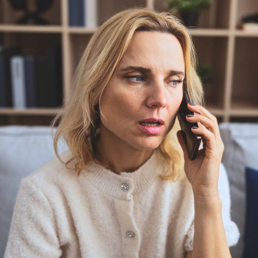 Woman saying "you can't trust them" while talking on the phone.