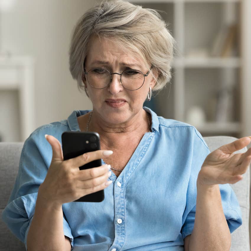 emotionally immature woman looking at phone trying to talk to her kids