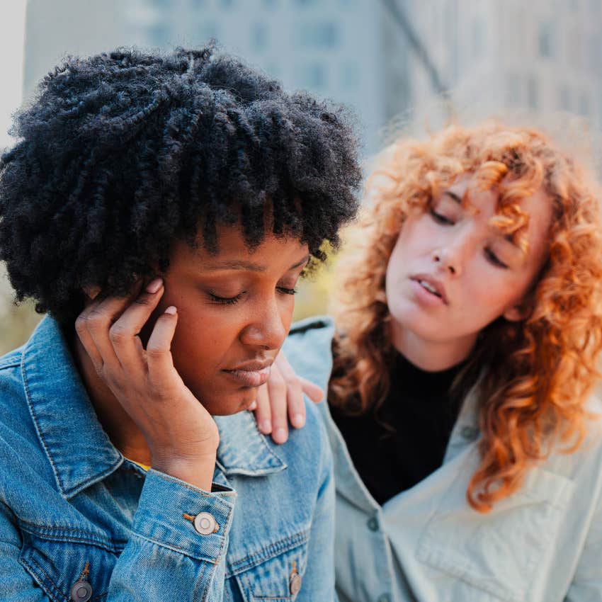 woman comforting friend telling her I just need some space