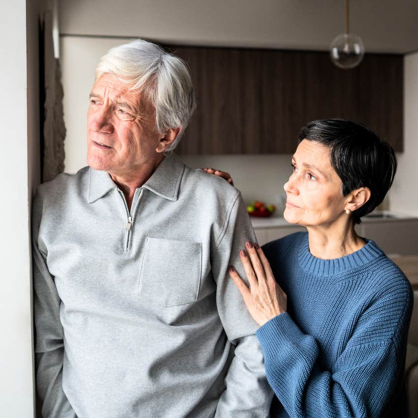 traumatized man saying I'd rather not speak about that to wife comforting him