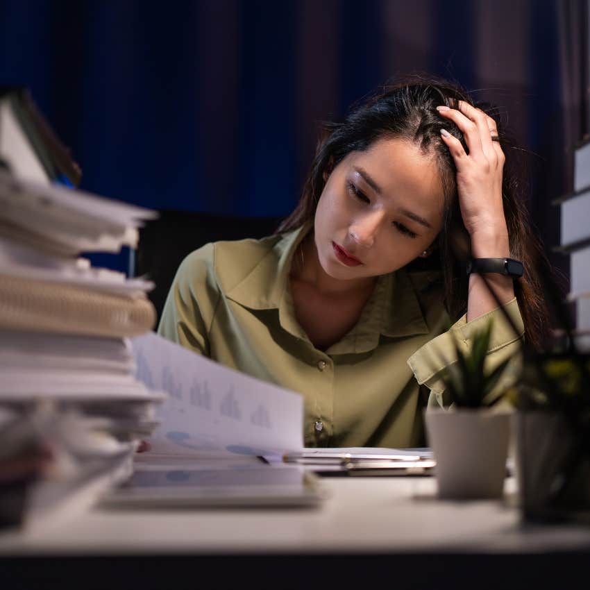 woman working hard because she thinks her work has to be perfect