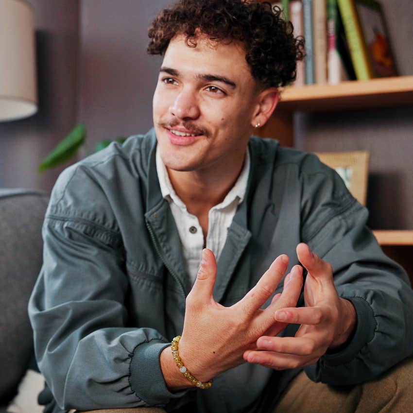 man with a deep mind saying tell me more about that to friend