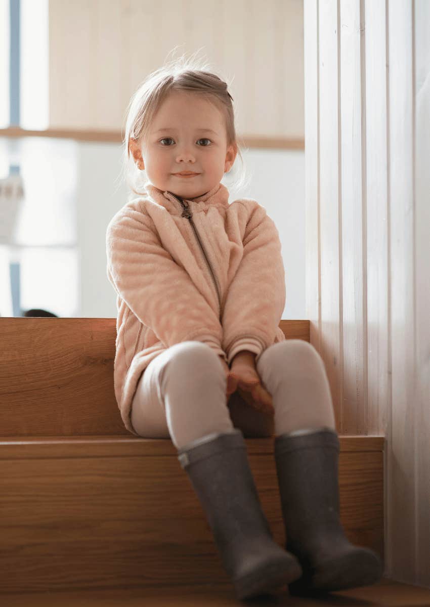 young girl smiling innocently