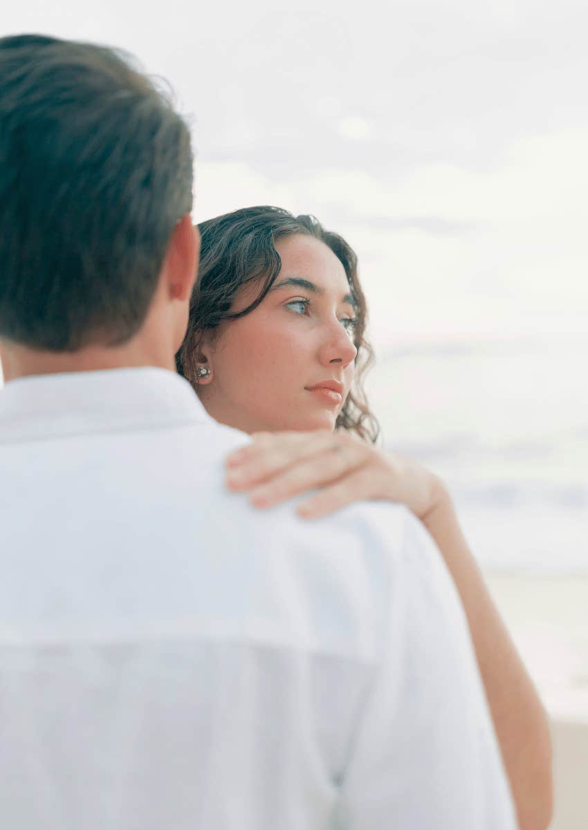 young woman looking away from partner