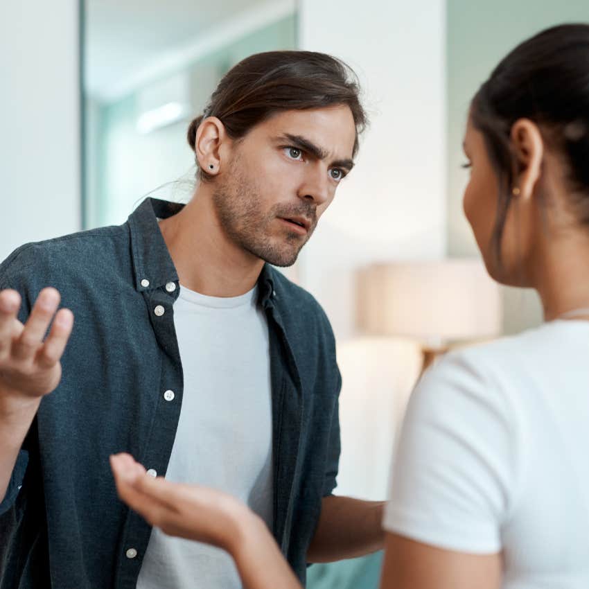 frustrated man feeling resentful of his partner in conversation