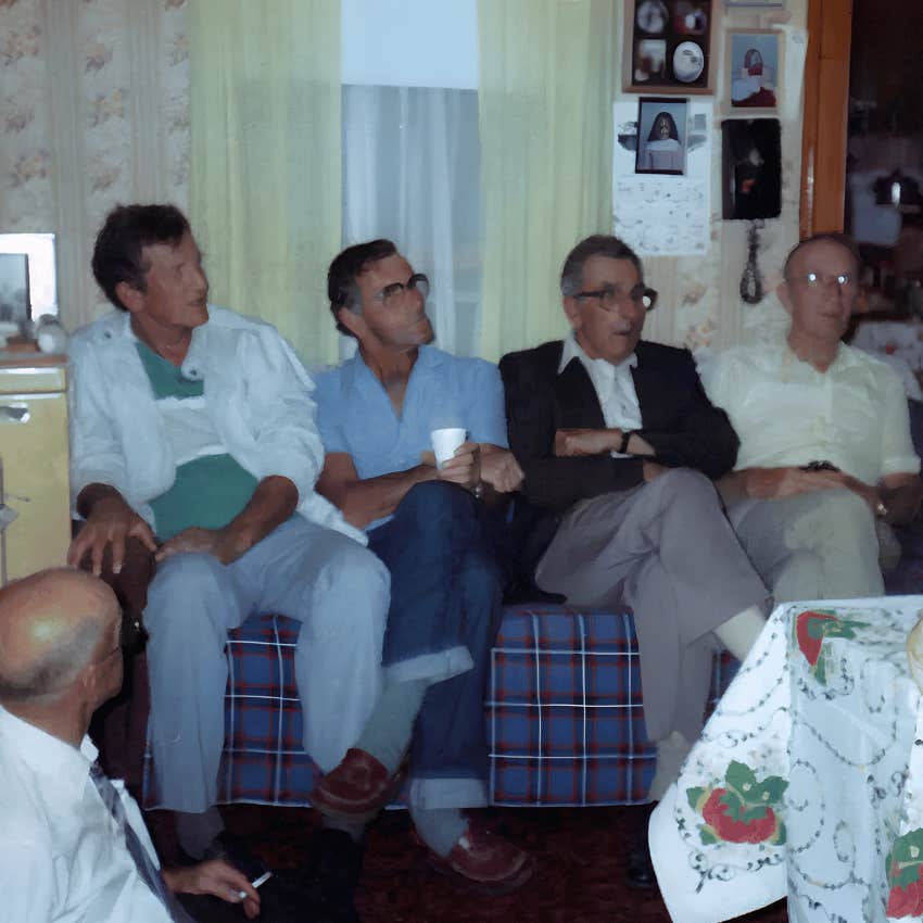author's family sitting together on couch