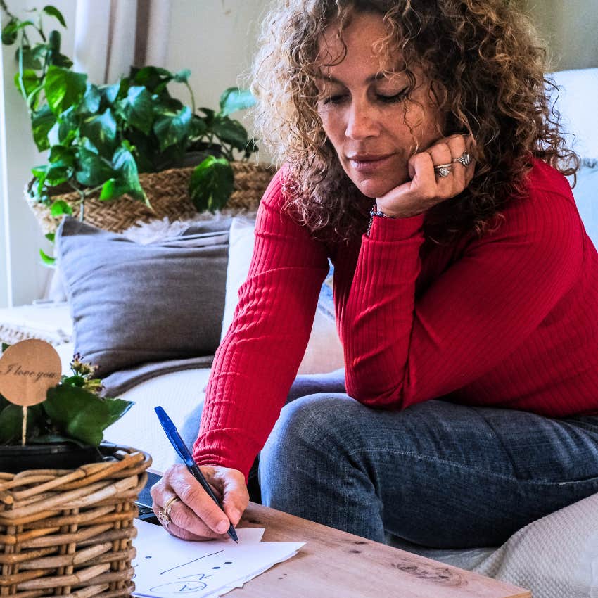 gen X woman writing a handwritten thank you note with her basic manners