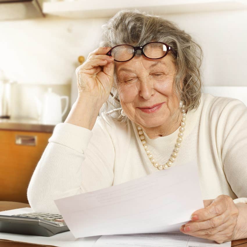 boomer woman looking at her saved receipts