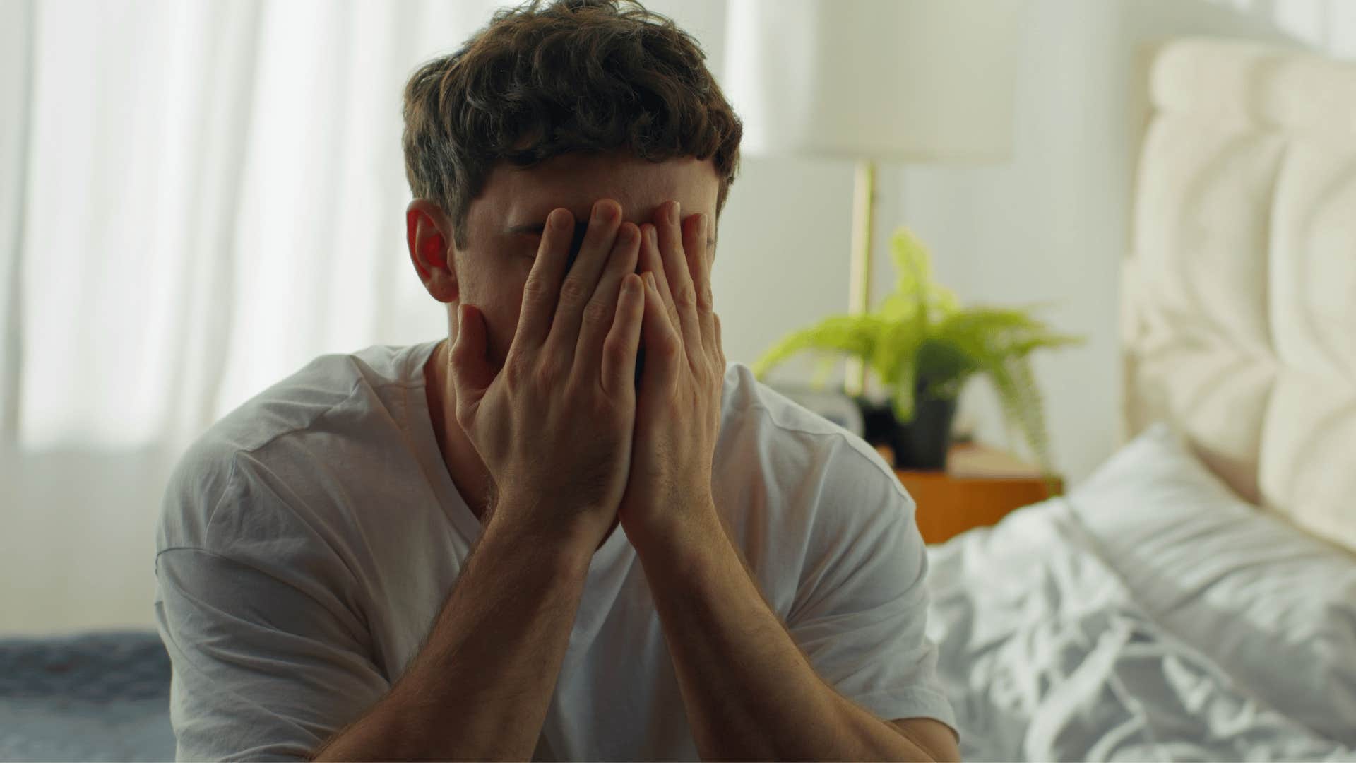 stressed millennial man feeling behind in life