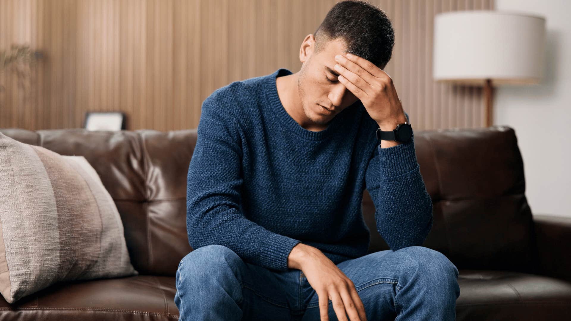 millennial man stressing out about feeling burnt out
