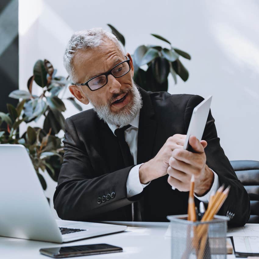 boomer man at work enjoying stability