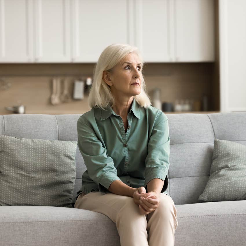 boomer woman at home thinking deeply about loneliness