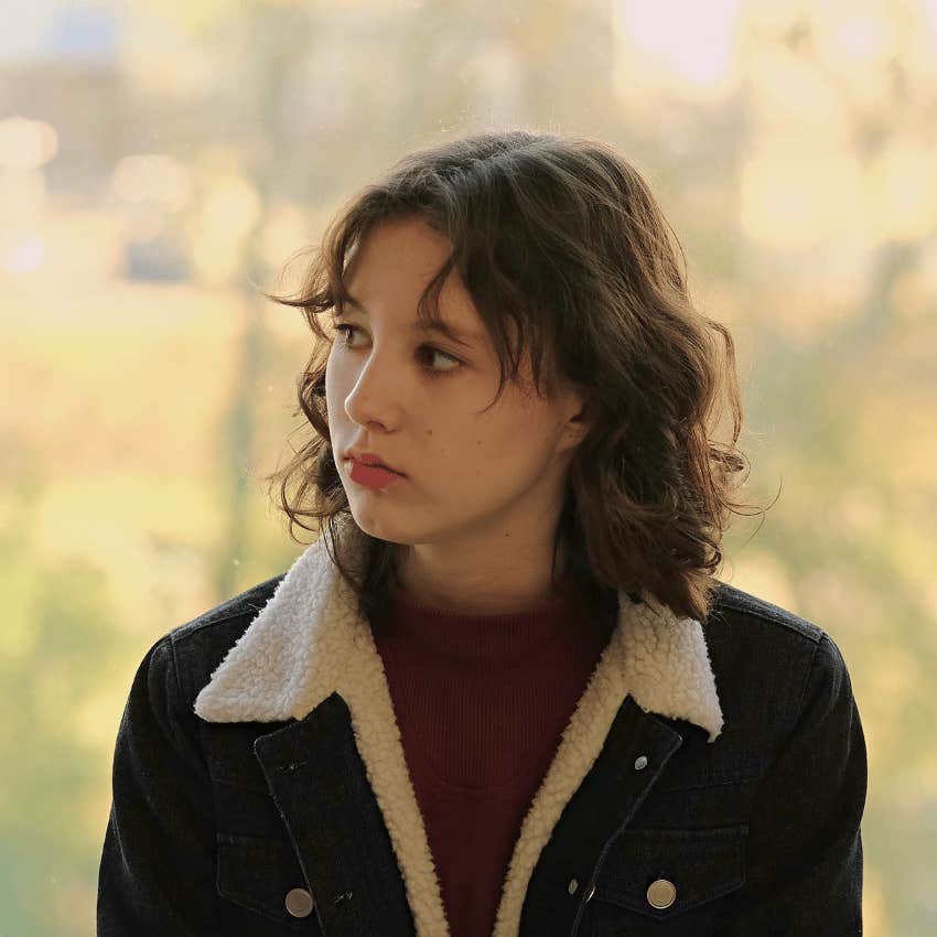 calm young woman knowing that feeling aren't facts