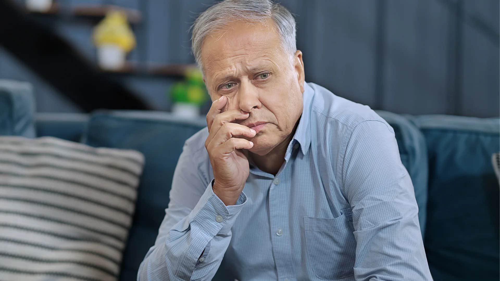 man who has lost his independence looking stressed at home