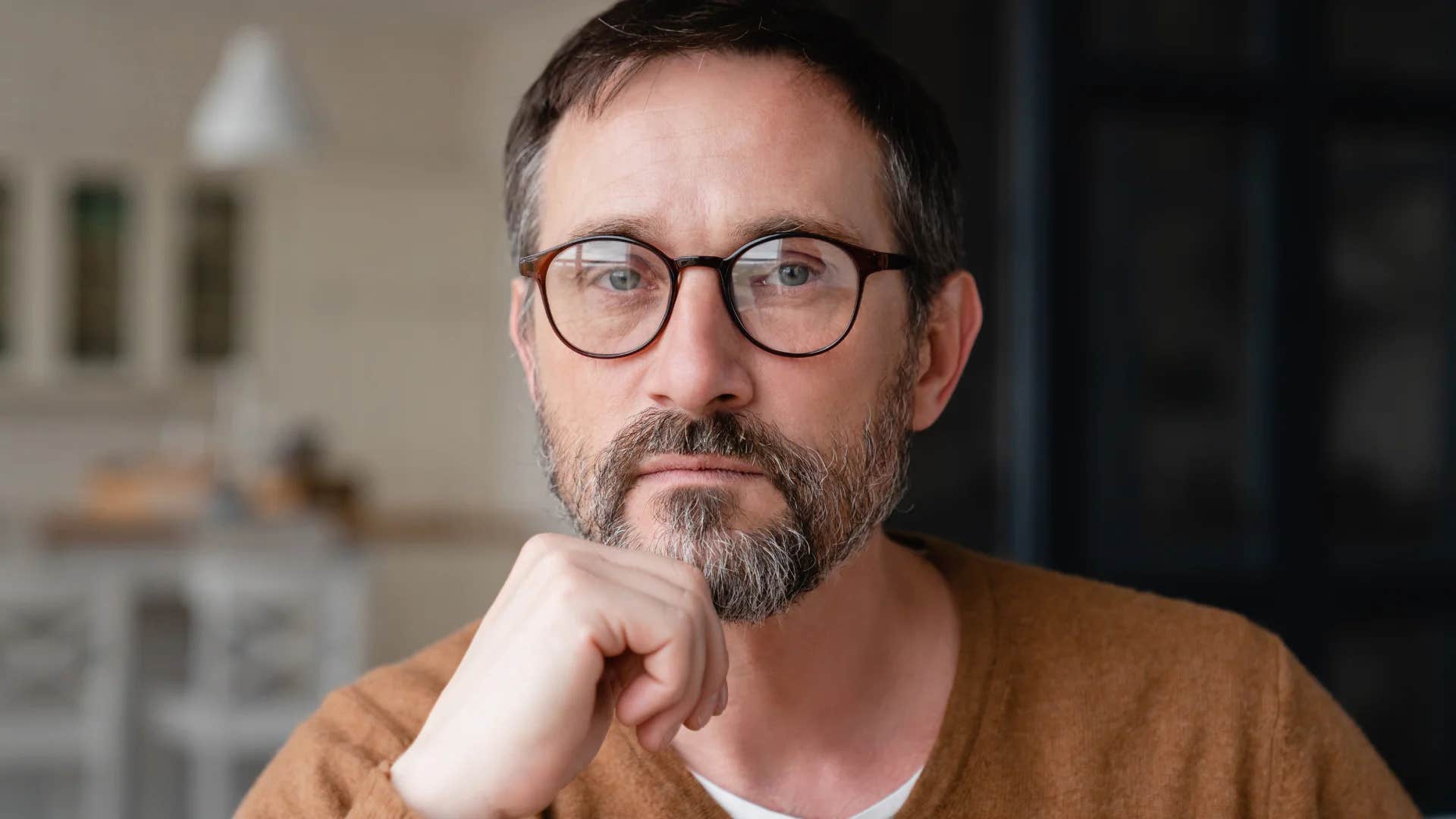 man feeling lonely living alone