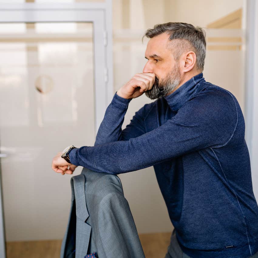 Person standing deep in thought while trusting a strong intuitive feeling about which direction to take