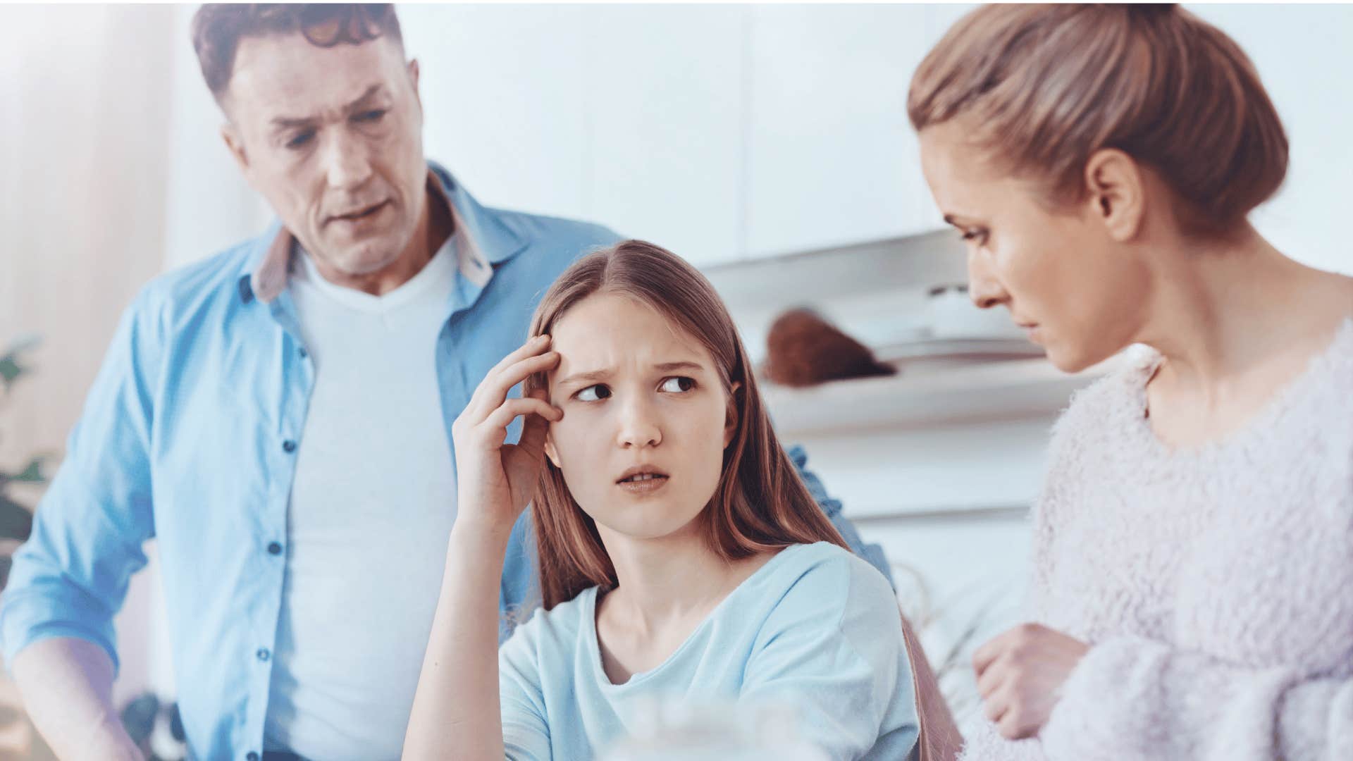 parents lecturing their daughter about her job defining her
