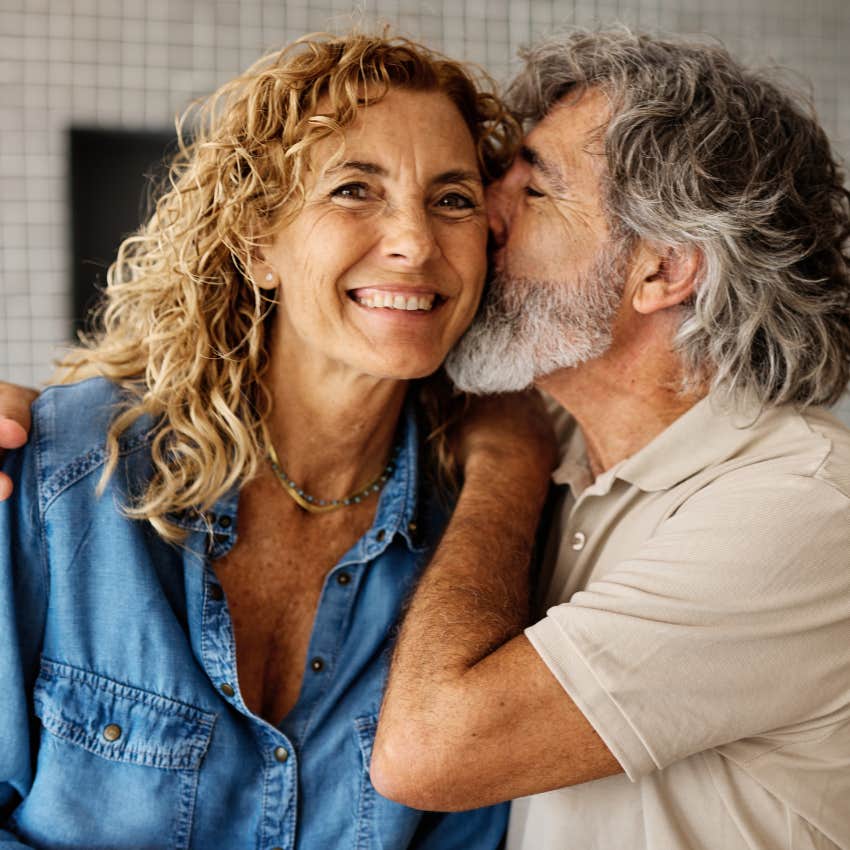 happy couple smiling together saying yes in their relationship