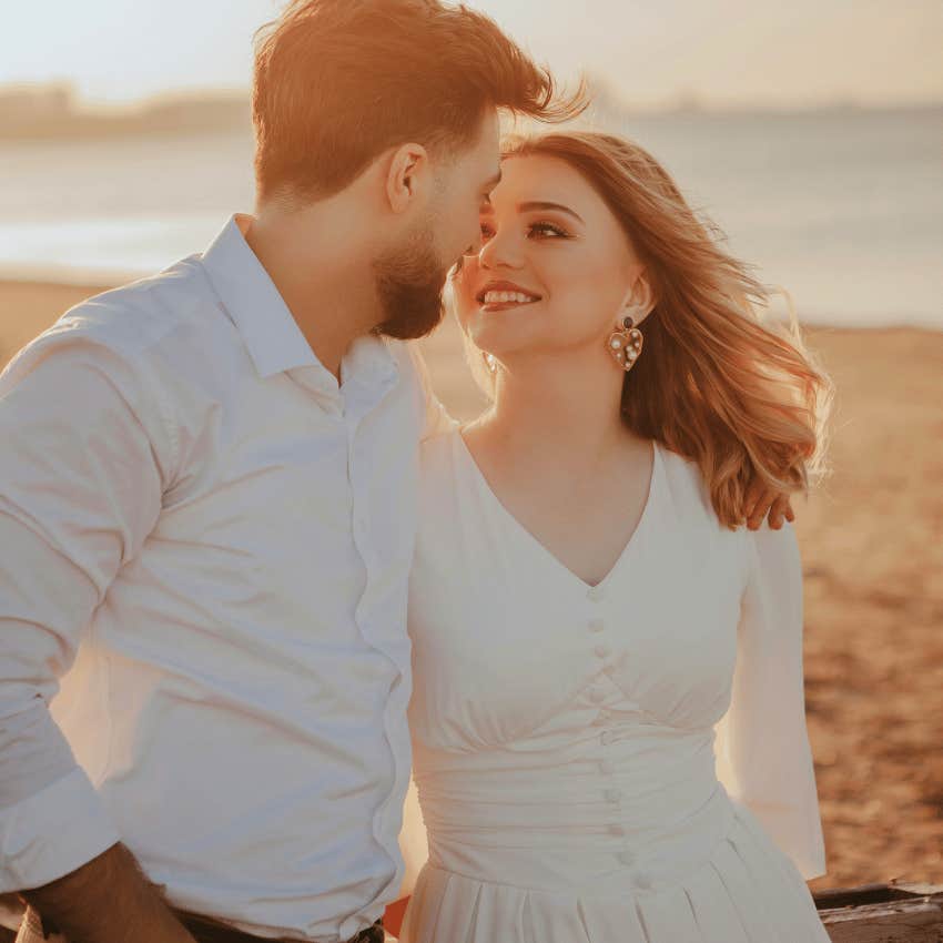 couple in love walking on beach