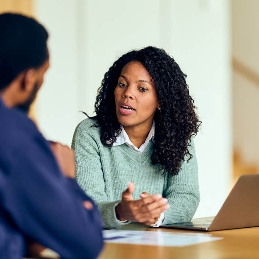 intellectual woman telling colleague I just need a second