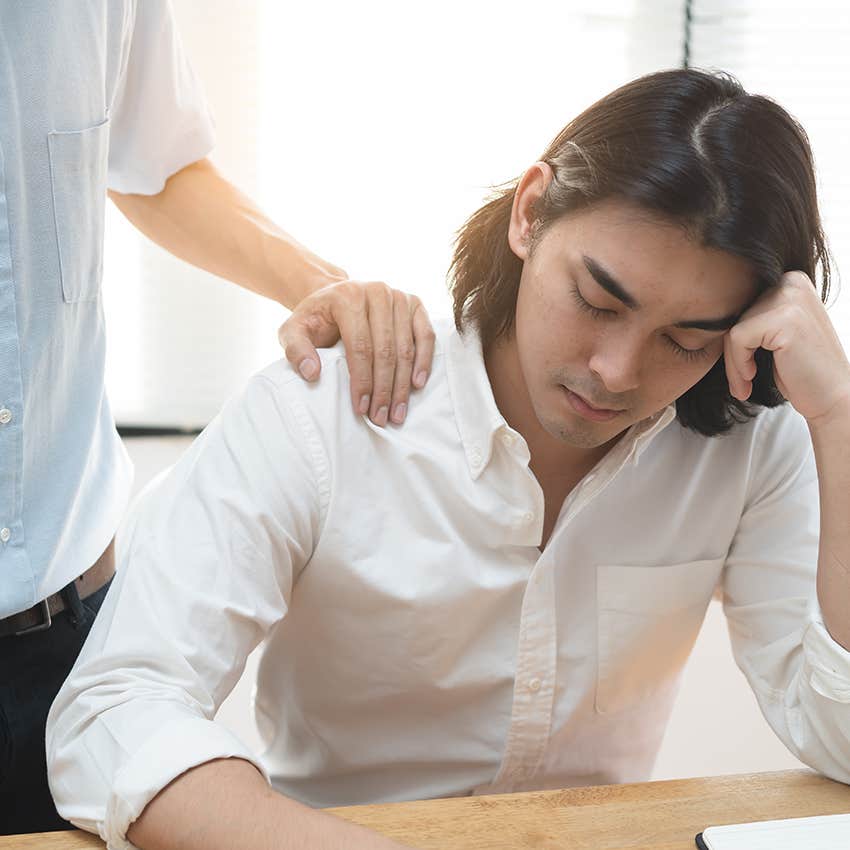 man comforting upset friend saying that makes sense
