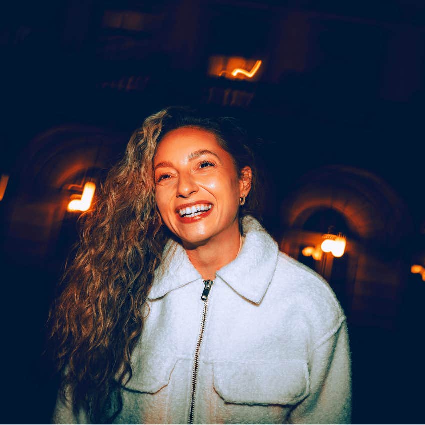 emotionally stable woman smiling wide