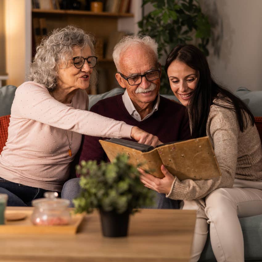 woman spending time with parents looking at memories because anytime could be the last time they are together