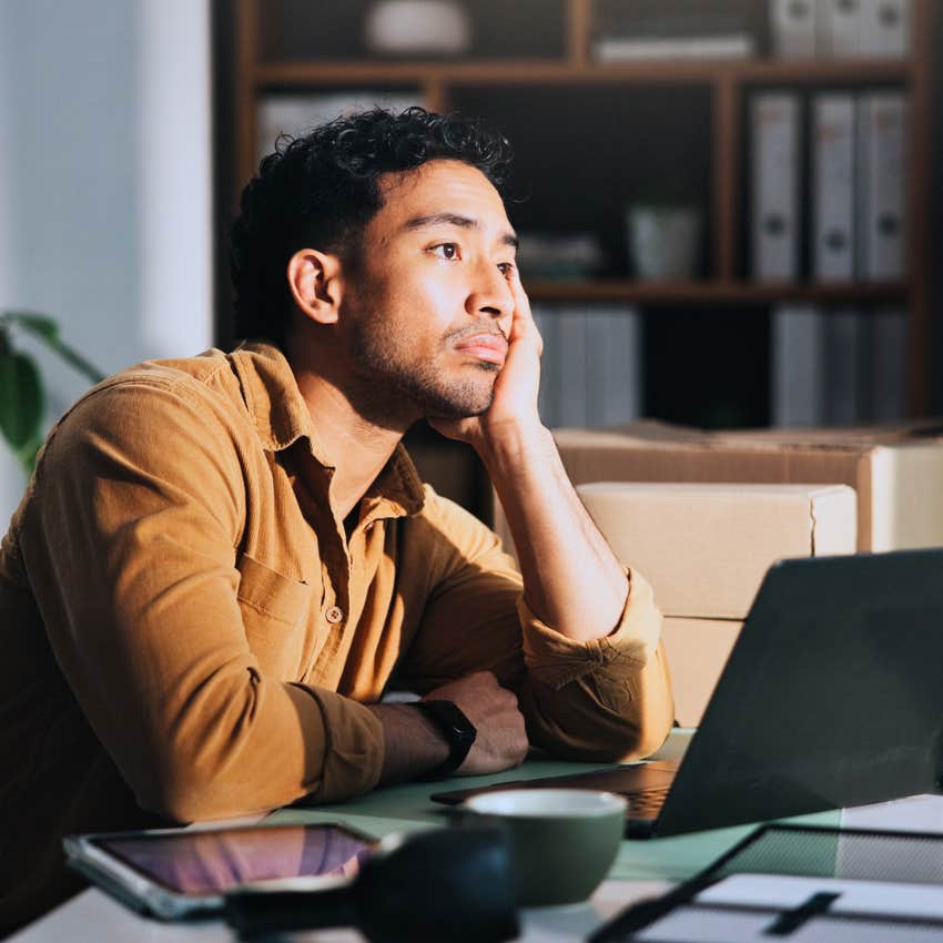 stressed millennial man living to work