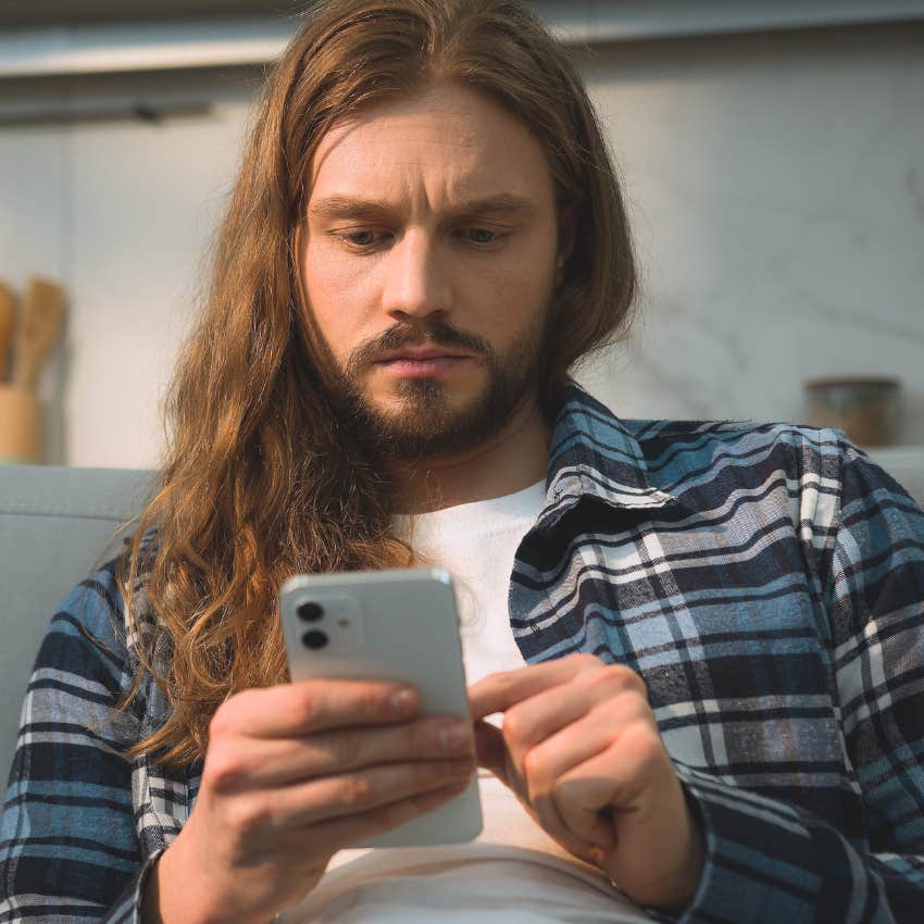 Gen Z man using YouTube to learn something new