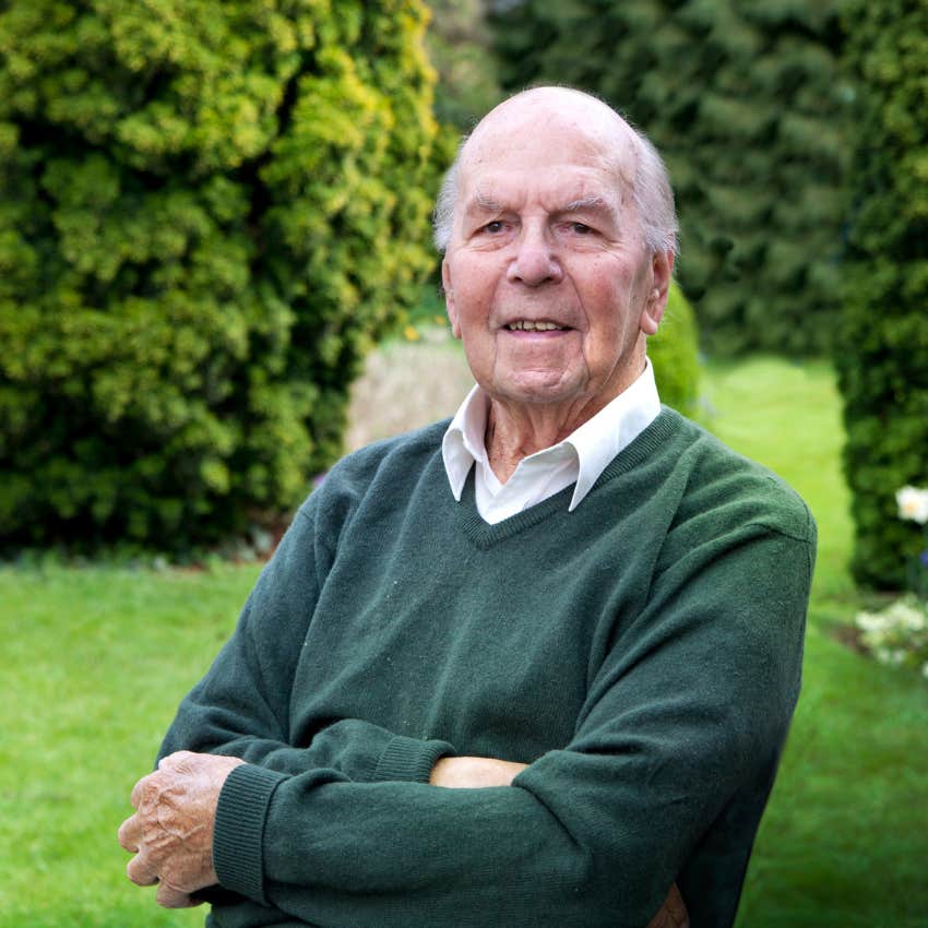 boomer man smiling in his garden