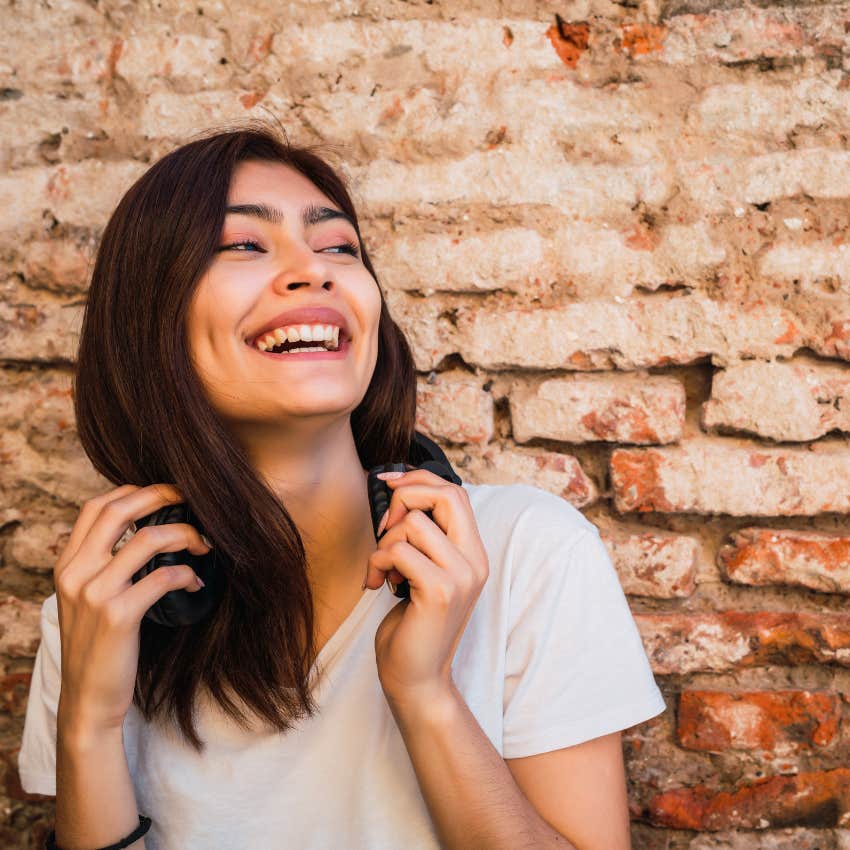 gen z woman who feels rich because of her lifestyle