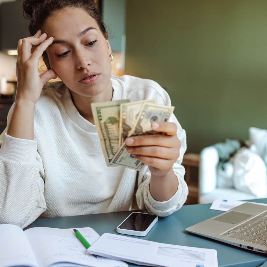 millennial woman worried about being poor