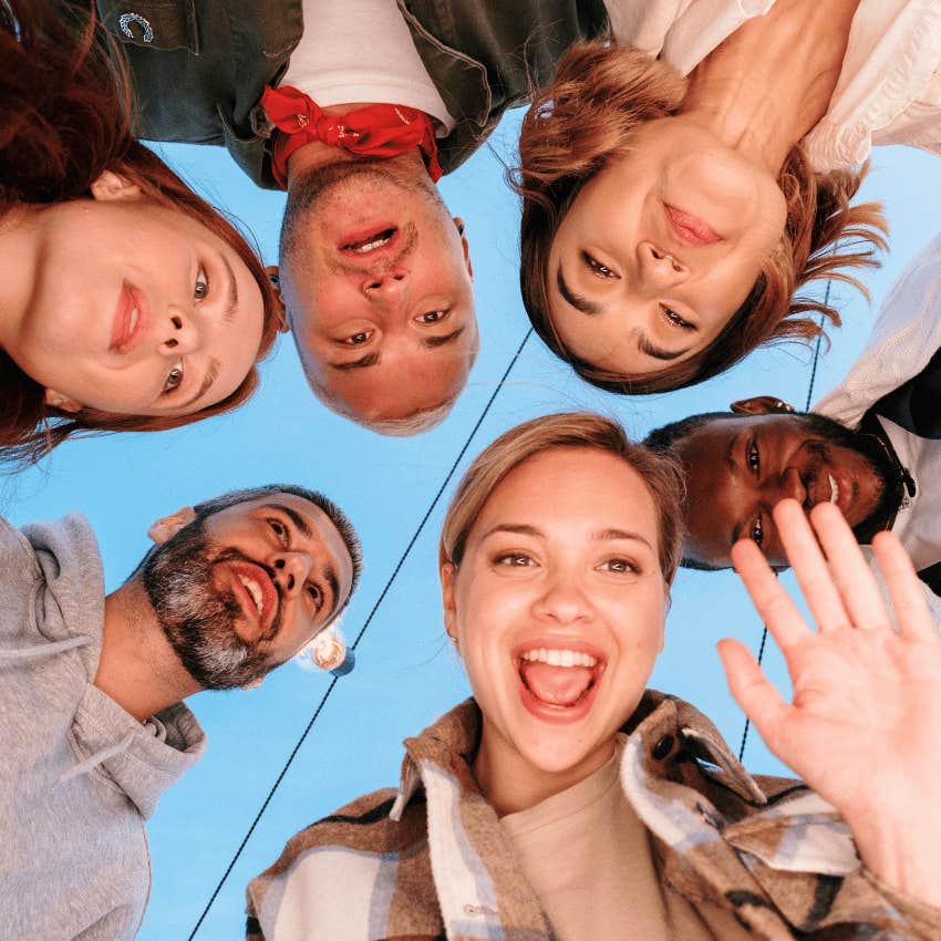 group of friends standing in a circle