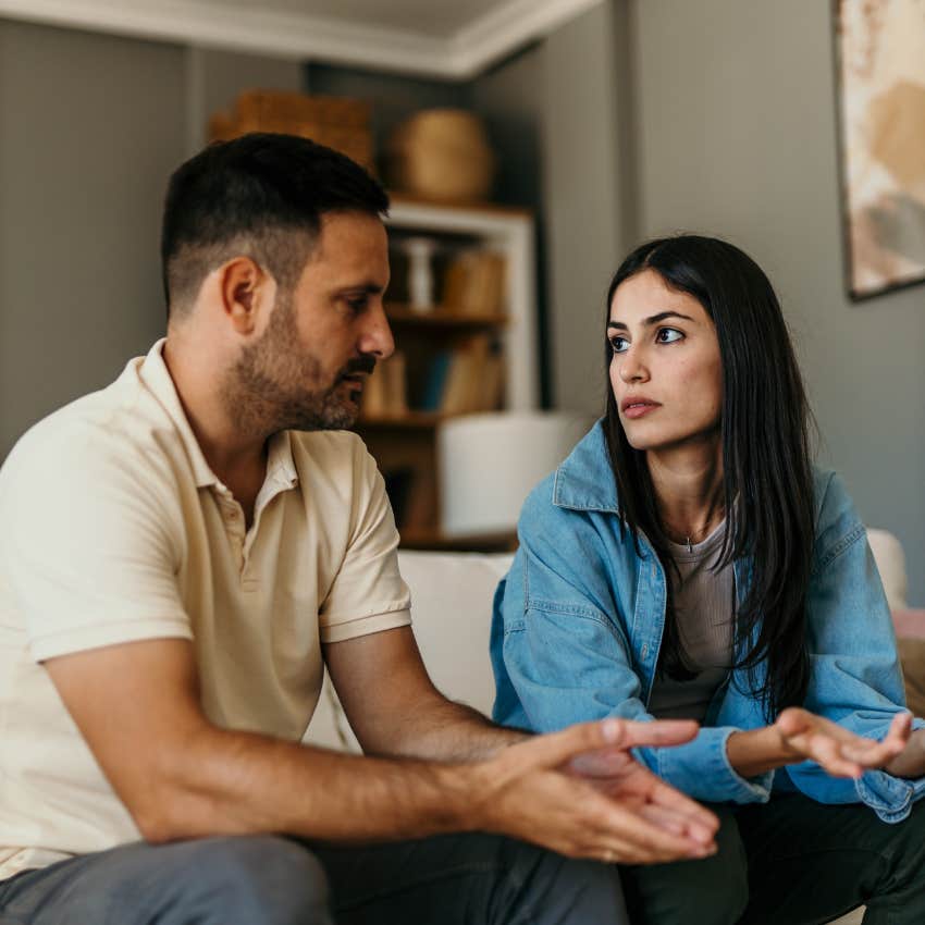 confident woman admitting to boyfriend she was wrong