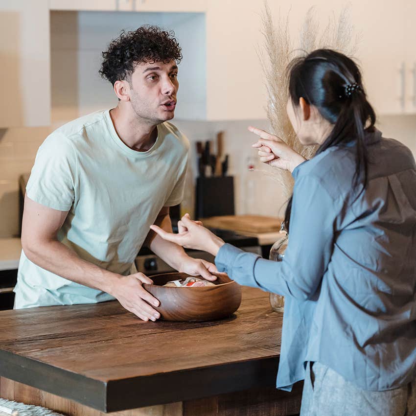 young couple in heated argument at home