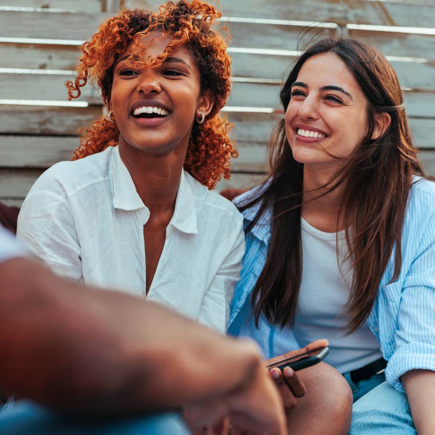 friends pretending to be interested in what man has to say