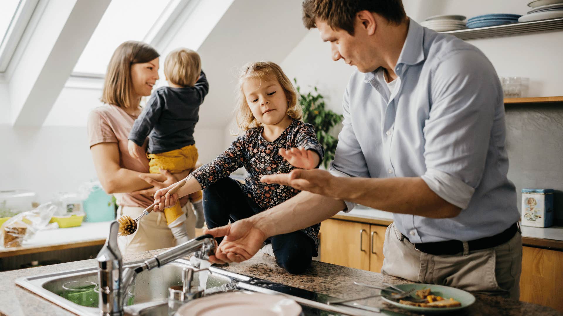 happy couple dividing household labor