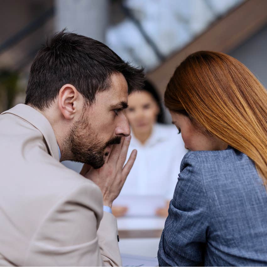 Man who's a chronic gossipper talking to a co-worker