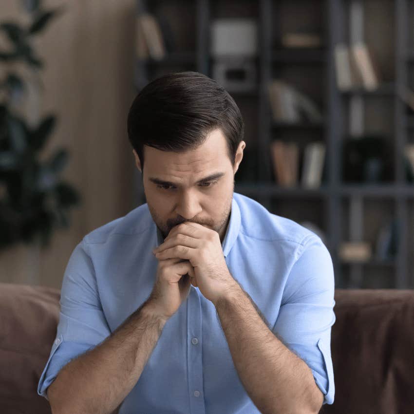 insecure man being a doormat looking down