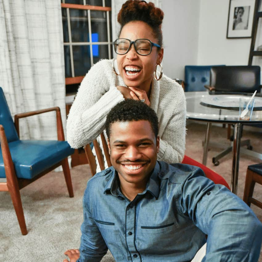 loving couple sitting close at home