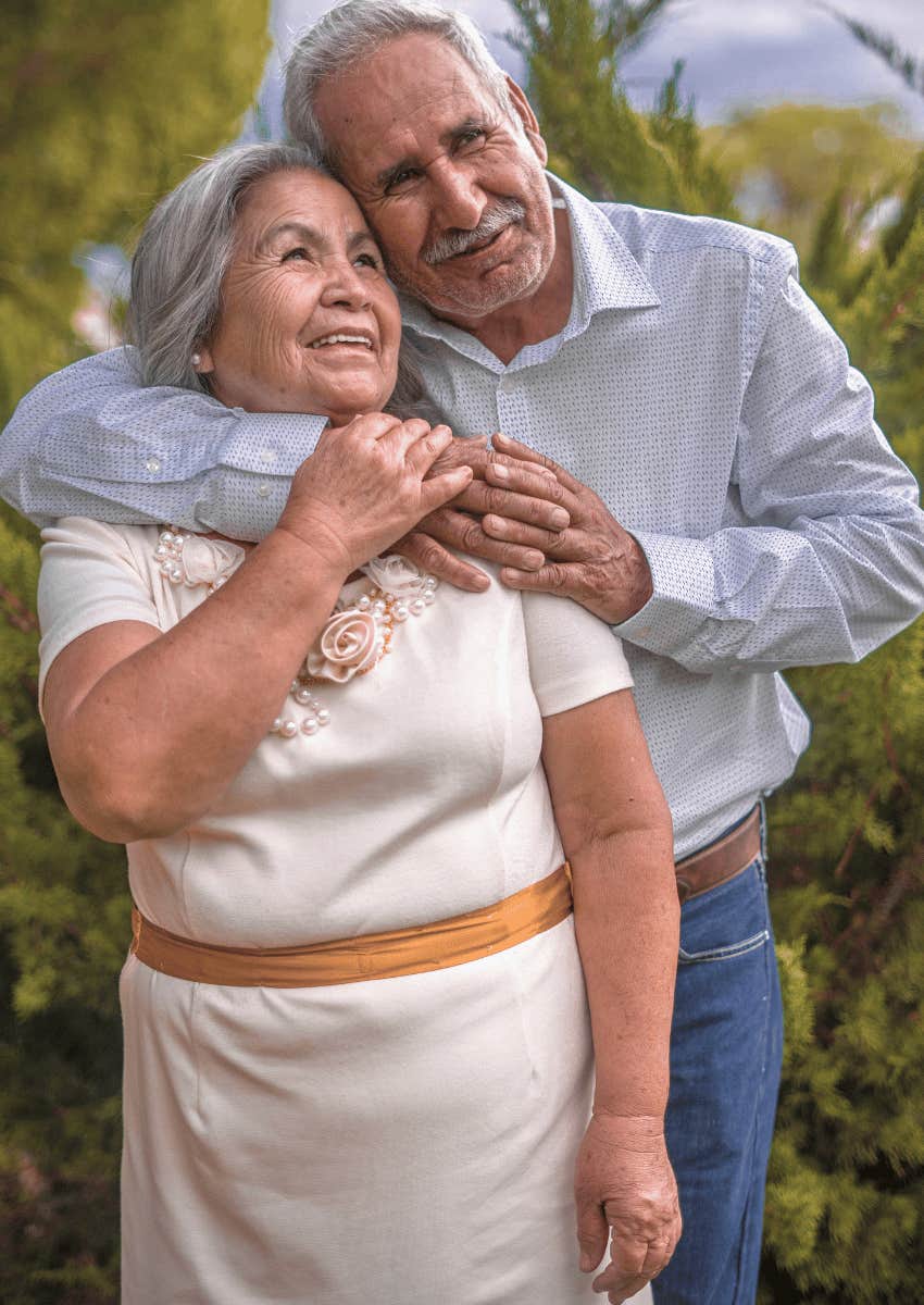 loving older couple hugging