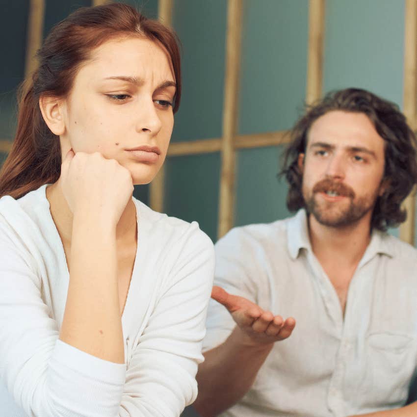 man critiquing his female partner