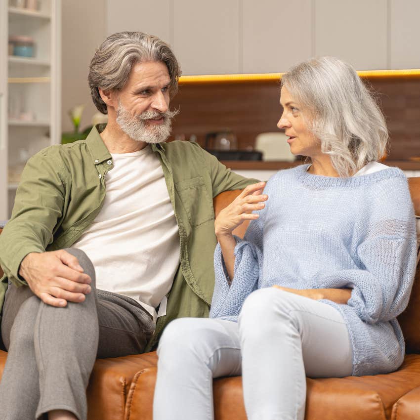 happy husband man actively listening to his wife in conversation