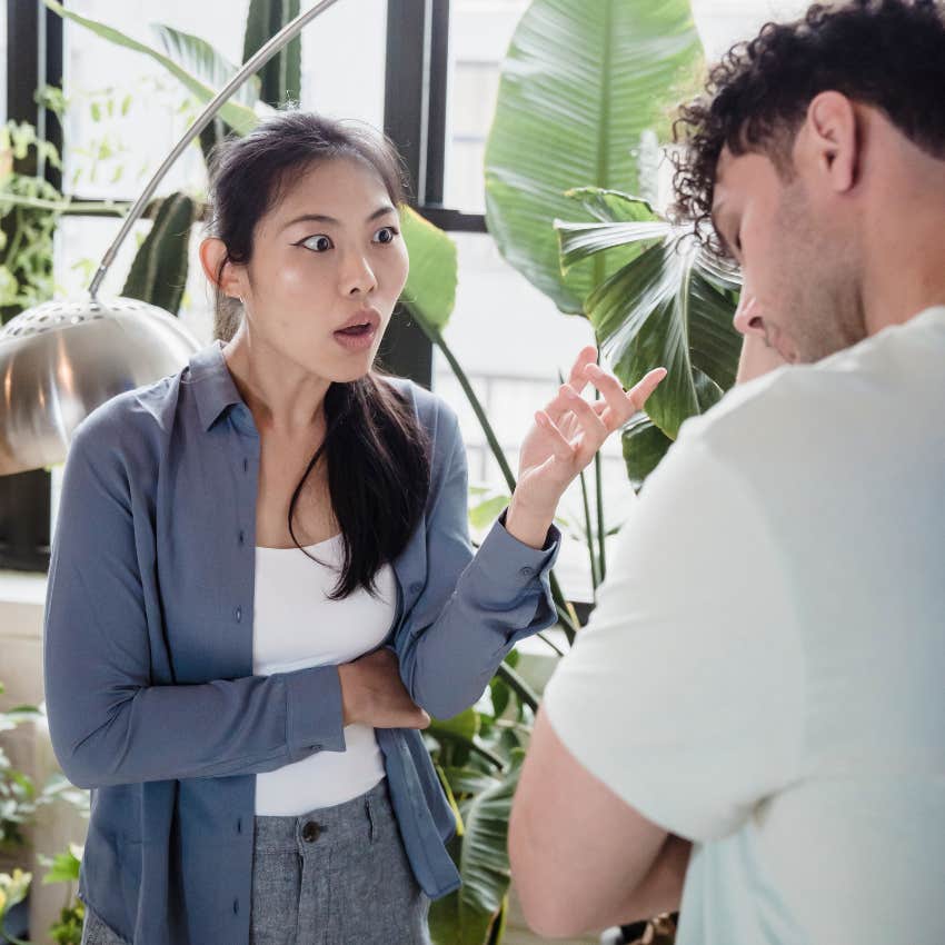 annoyed rigid woman judgmentally telling man you don't know what youre talking about