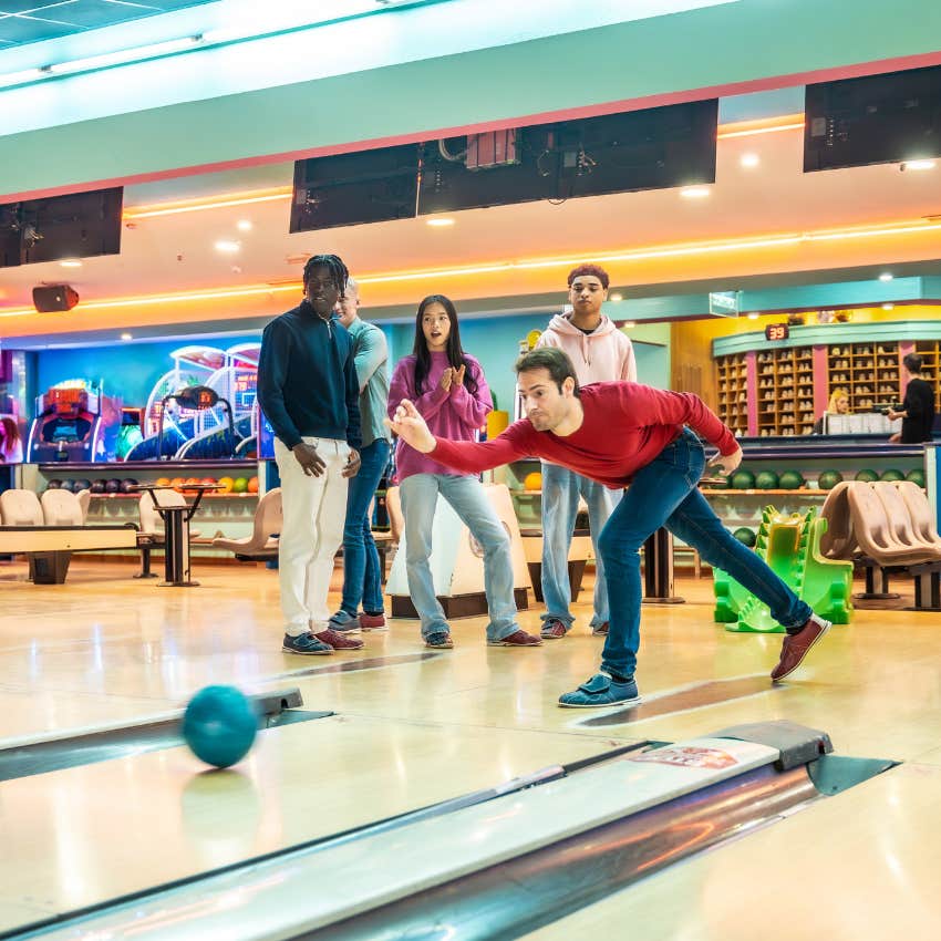 group of co-workers at the bowling alley after work