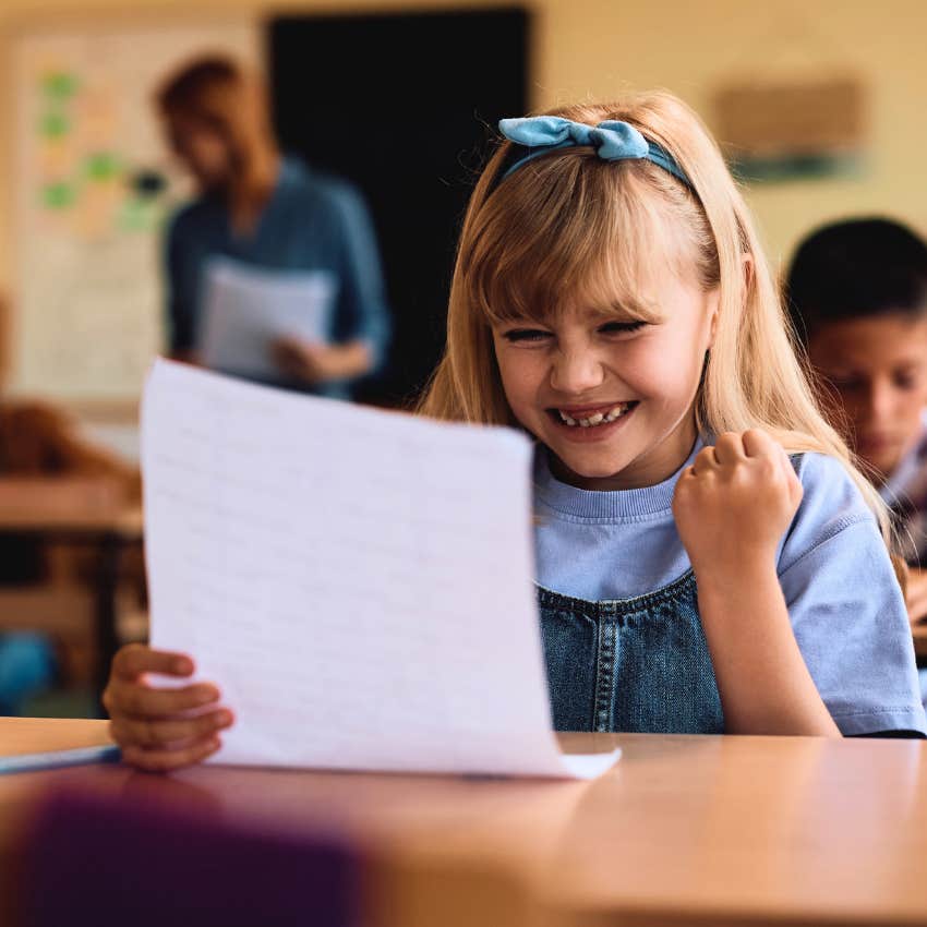 Little girl who believes that good grades are everything at school.