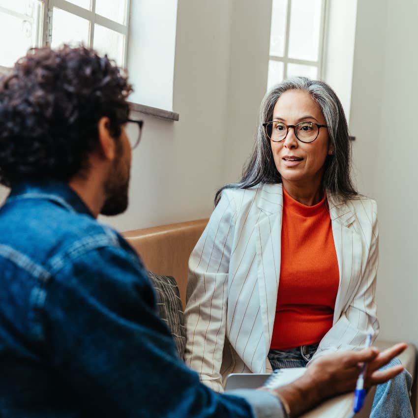 intuitive woman observing a man's body language