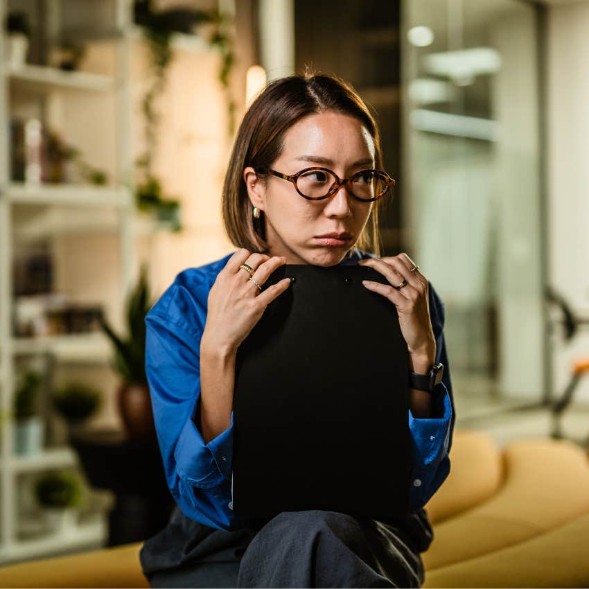 Woman who's afraid of success at home.