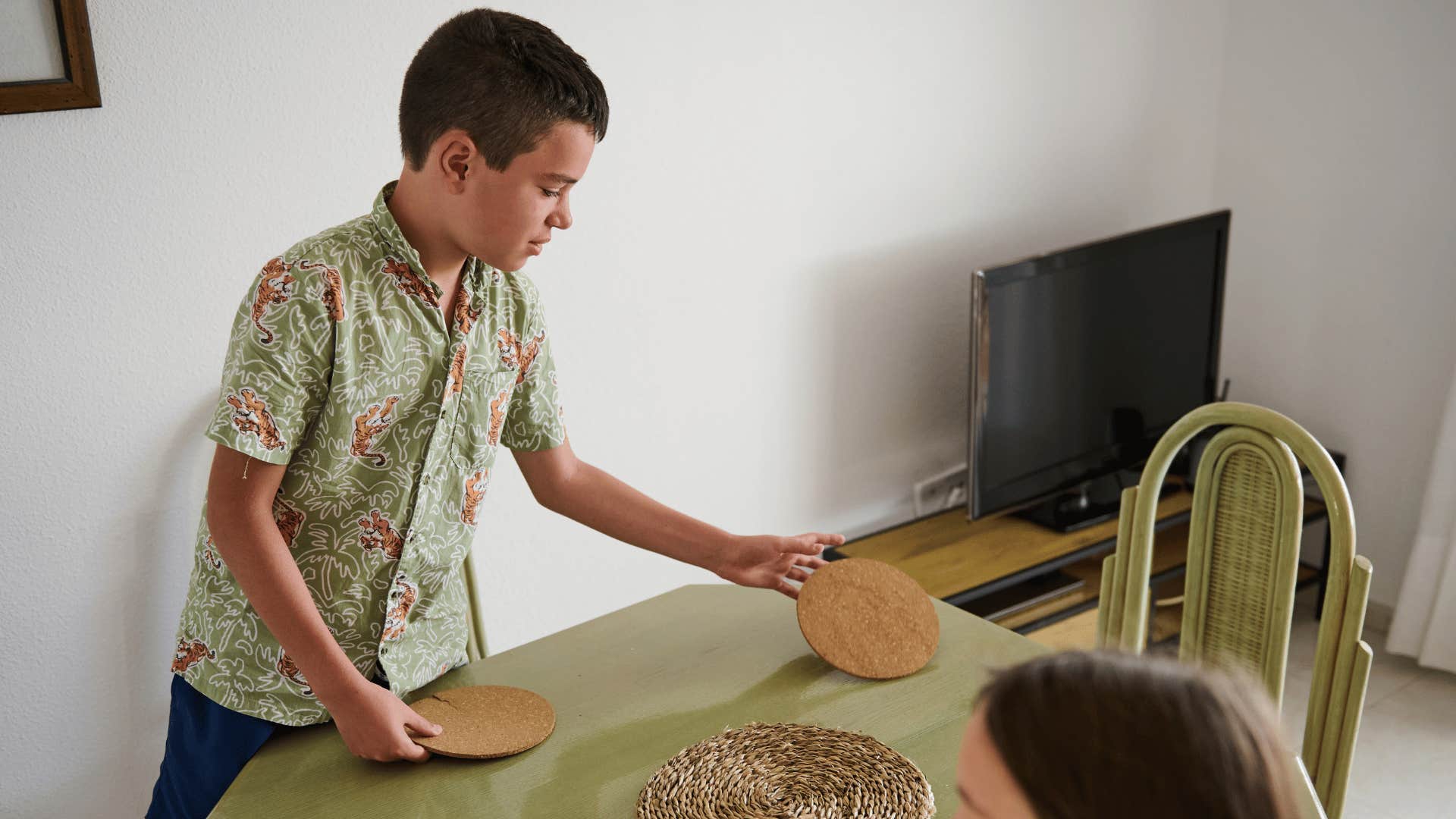 kids setting the table as a chore at home